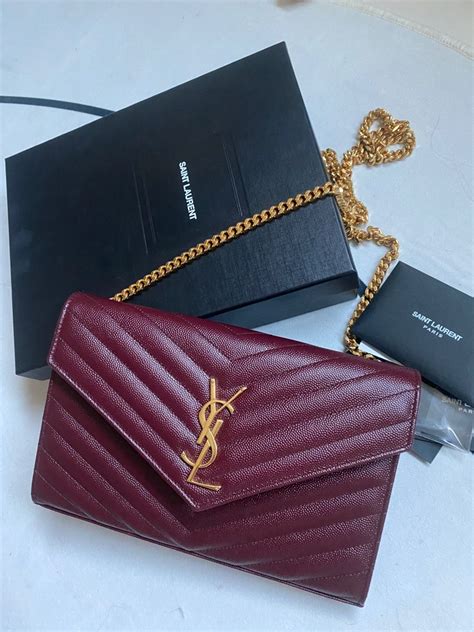 ysl monogram quilted leather envelope wallet on chain|YSL cassandra chain wallet.